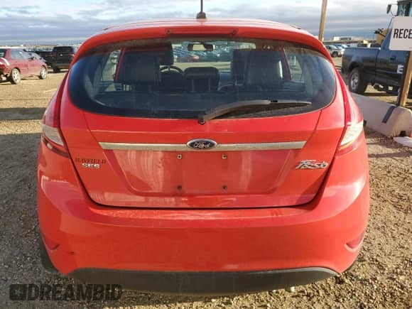 2012 Ford Fiesta SES with VIN 3FADP4FJ0CM174727, listed as a Copart auction lot 86832155 with 135,586 mi miles and Salvage title. Bid and sale history available at DreamBid. Image 6.