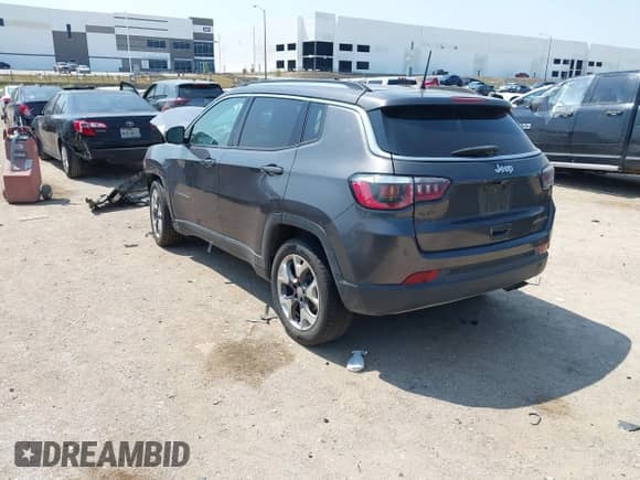 2020 Jeep Compass Limited with VIN 3C4NJCCB5LT114424, listed as a IAAI auction lot 43164924 with 99,096 mi miles and . Bid and sale history available at DreamBid. Image 3.