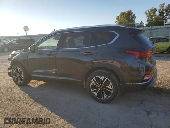 2020 Hyundai Santa Fe Limited z VIN 5NMS53AAXLH275723, wystawiony jako Copart lot #86650845 z przebiegiem 101 571 mil mil oraz Szkoda całkowita • Salvage title. Historia ofert i sprzedaży dostępna na DreamBid. Obrazek 2.