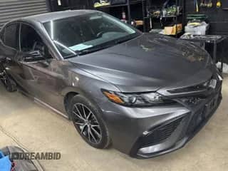 2024 Toyota Camry SE with VIN 4T1G11AK4RU899030, listed as a Copart auction lot 84167465 with 43,968 mi miles and Clean title. Bid and sale history available at DreamBid. Image 1.
