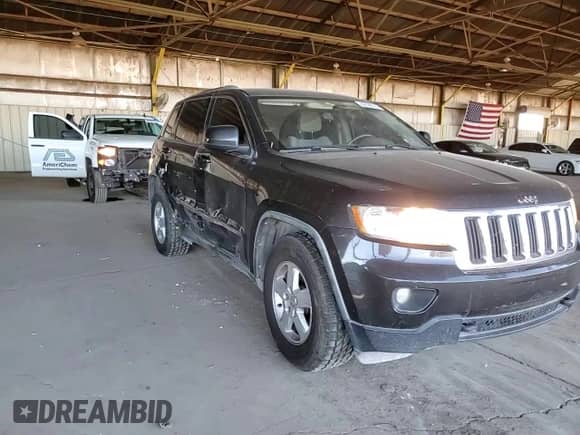 2011 Jeep Grand Cherokee Laredo с VIN 1J4RR4GG3BC660942, выставлен на аукционе Copart как лот 82198165 с пробегом 174 604 миль миль и Списание • Salvage title. История ставок и продаж доступна на DreamBid. Изображение 14.