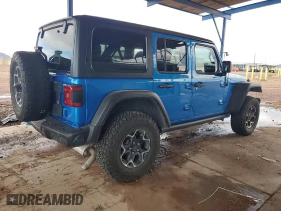 2023 Jeep Wrangler Rubicon с VIN 1C4JJXR69PW581362, выставлен на аукционе Copart как лот 58557795 с пробегом 34 357 миль миль и Списание • Salvage title. История ставок и продаж доступна на DreamBid. Изображение 3.