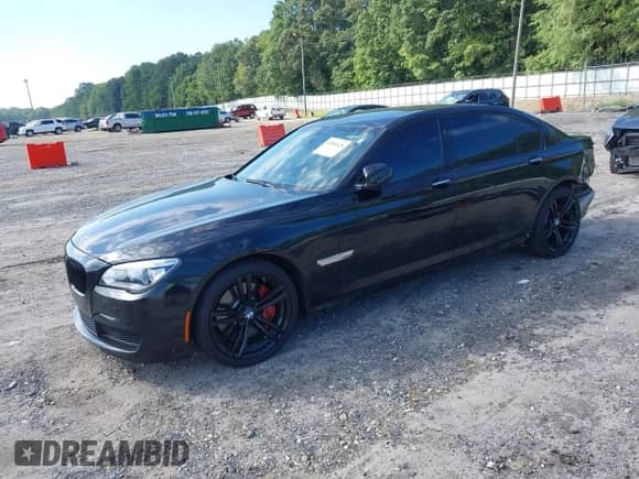 2013 BMW 7 Series 750Li xDrive with VIN WBAYF8C54DD141690, listed as a IAAI auction lot 42804428 with 120,000 mi miles and . Bid and sale history available at DreamBid. Image 2.