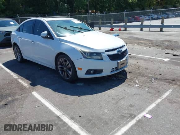 2013 Chevrolet Cruze LTZ with VIN 1G1PG5SB1D7225832, listed as a IAAI auction lot 43171487 with 183,312 mi miles and . Bid and sale history available at DreamBid. Image 1.