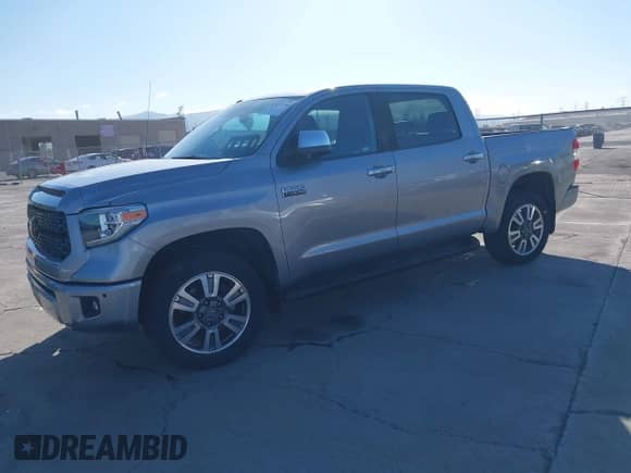 2019 Toyota Tundra SR5 with VIN 5TFAY5F1XKX817867, listed as a IAAI auction lot 41839736 with 61,102 mi miles and . Bid and sale history available at DreamBid. Image 2.