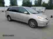 2006 Toyota Sienna XLE z VIN 5TDBA22C06S075554, wystawiony jako Copart lot #69133605 z przebiegiem 188 185 mil mil oraz Szkoda całkowita • Salvage title. Historia ofert i sprzedaży dostępna na DreamBid. Obrazek 4.