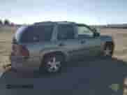 2004 Chevrolet TrailBlazer LS z VIN 1GNDT13S042157170, wystawiony jako Copart lot #84997275 z przebiegiem 203 657 mil mil oraz Szkoda całkowita • Salvage title. Historia ofert i sprzedaży dostępna na DreamBid. Obrazek 3.