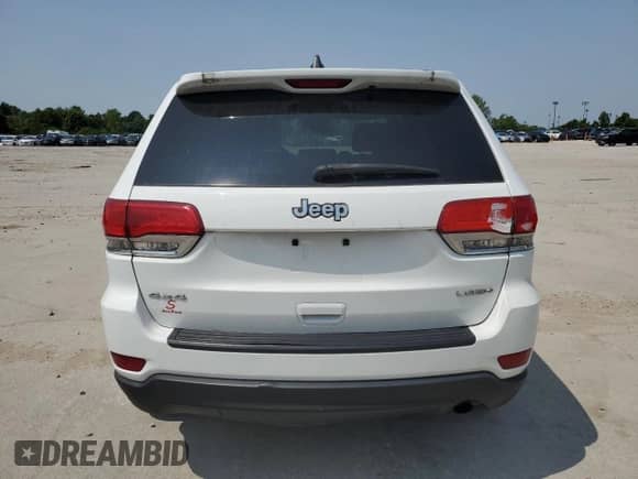 2014 Jeep Grand Cherokee Laredo z VIN 1C4RJFAG5EC289207, wystawiony jako Copart lot #57971885 z przebiegiem 149 465 mil mil oraz Szkoda całkowita • Salvage title. Historia ofert i sprzedaży dostępna na DreamBid. Obrazek 6.