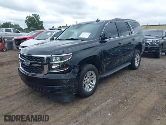 2015 Chevrolet Tahoe LT z VIN 1GNSKBKC2FR728646, wystawiony jako IAAI lot #42914435 z przebiegiem 137 284 mil mil oraz . Historia ofert i sprzedaży dostępna na DreamBid. Obrazek 2.