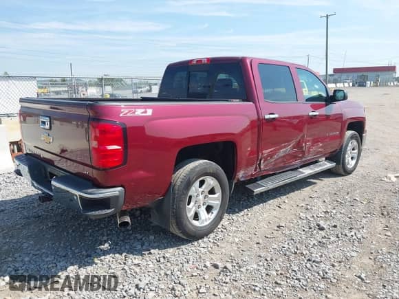 2014 Chevrolet Silverado 1500 LT z VIN 3GCUKREC9EG158245, wystawiony jako IAAI lot #43159415 z przebiegiem 161 214 mil mil oraz . Historia ofert i sprzedaży dostępna na DreamBid. Obrazek 4.
