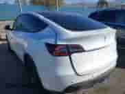 2022 Tesla Model Y Performance with VIN 7SAYGDEFXNF484838, listed as a IAAI auction lot 43492940 with 8,729 mi miles and . Bid and sale history available at DreamBid. Image 3.