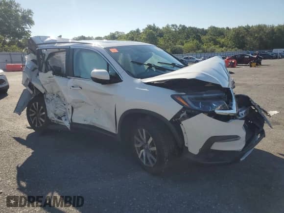 2020 Honda Pilot EX-L z VIN 5FNYF6H57LB027108, wystawiony jako Copart lot #70009905 z przebiegiem Nie podano mil oraz Szkoda całkowita • Salvage title. Historia ofert i sprzedaży dostępna na DreamBid. Obrazek 4.