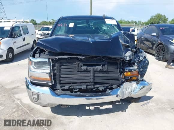 2017 Chevrolet Silverado 1500 LT z VIN 1GCVKRECXHZ401134, wystawiony jako IAAI lot #42974829 z przebiegiem 107 239 mil mil oraz . Historia ofert i sprzedaży dostępna na DreamBid. Obrazek 12.