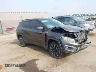 2019 Jeep Compass Trailhawk z VIN 3C4NJDDB4KT721966, wystawiony jako IAAI lot #42974898 z przebiegiem 119 602 mil mil oraz . Historia ofert i sprzedaży dostępna na DreamBid. Obrazek 1.