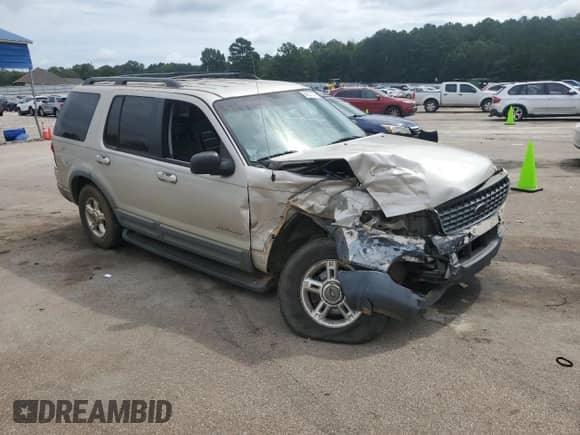 2002 Ford Explorer XLT with VIN 1FMZU63E32UC44125, listed as a Copart auction lot 64127365 with 183,622 mi miles and Salvage title. Bid and sale history available at DreamBid. Image 4.