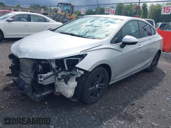 2016 Chevrolet Cruze LT with VIN 1G1BE5SM7G7318795, listed as a IAAI auction lot 43049413 with 100,259 mi miles and . Bid and sale history available at DreamBid. Image 2.