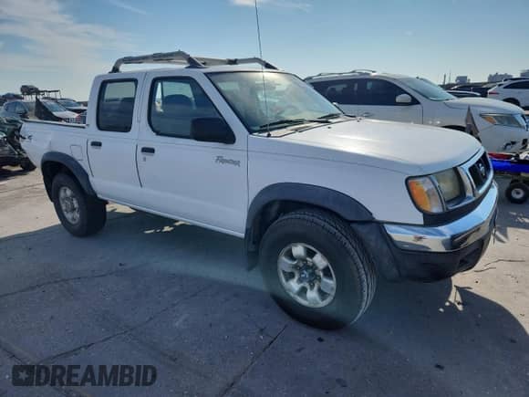 2000 Nissan Frontier XE with VIN 1N6ED27Y8YC427340, listed as a Copart auction lot 81788645 with 165,147 mi miles and Salvage title. Bid and sale history available at DreamBid. Image 4.