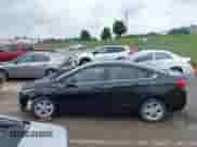 2018 Chevrolet Cruze LT z VIN 1G1BH5SE7J7189867, wystawiony jako IAAI lot #42405136 z przebiegiem 86 509 mil mil oraz . Historia ofert i sprzedaży dostępna na DreamBid. Obrazek 14.