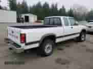 1993 Dodge Dakota z VIN 1B7GG23XXPS129182, wystawiony jako Copart lot #88786935 z przebiegiem 176 015 mil mil oraz Szkoda całkowita • Salvage title. Historia ofert i sprzedaży dostępna na DreamBid. Obrazek 3.