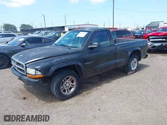 2002 Dodge Dakota с VIN 1B7FL16XX2S639103, выставлен на аукционе IAAI как лот 42519072 с пробегом 251 129 миль миль и . История ставок и продаж доступна на DreamBid. Изображение 17.