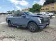 2023 Ford F-150 Lightning Pro with VIN 1FTVW1EV9PWG26295, listed as a Copart auction lot 80298305 with 43,492 mi miles and Salvage title. Bid and sale history available at DreamBid. Image 4.