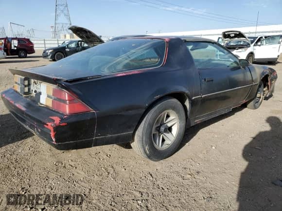 1984 Chevrolet Camaro Z28 Sport с VIN 1G1AP87G0EL170181, выставлен на аукционе Copart как лот 47371665 с пробегом 56 753 миль миль и Чистый • Clean title. История ставок и продаж доступна на DreamBid. Изображение 3.