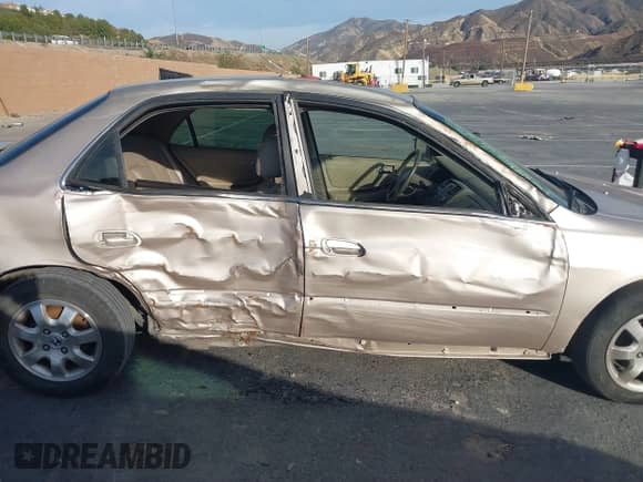 2002 Honda Accord EX z VIN JHMCG66042C025938, wystawiony jako IAAI lot #41569944 z przebiegiem 130 615 mil mil oraz . Historia ofert i sprzedaży dostępna na DreamBid. Obrazek 6.