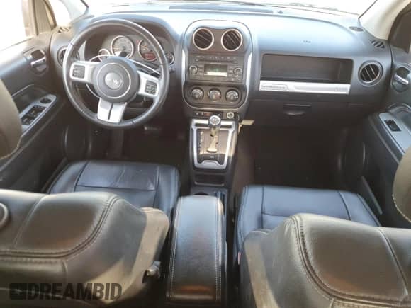 2017 Jeep Compass Latitude with VIN 1C4NJCEA9HD130529, listed as a Copart auction lot 52049285 with 82,338 mi miles and Salvage title. Bid and sale history available at DreamBid. Image 8.
