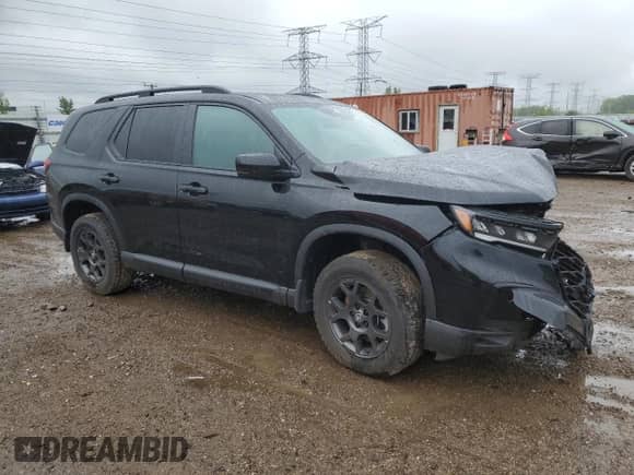 2023 Honda Pilot TrailSport with VIN 5FNYG1H69PB058097, listed as a Copart auction lot 57838855 with Not provided miles and Salvage title. Bid and sale history available at DreamBid. Image 4.