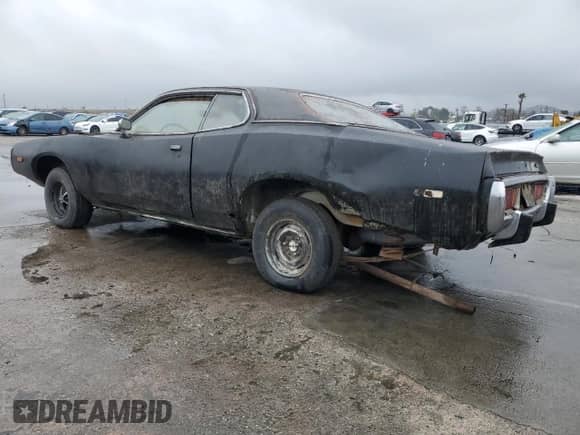 1973 Dodge Charger with VIN WH23G3G245906, listed as a Copart auction lot 42392095 with 26,222 mi miles and Clean title. Bid and sale history available at DreamBid. Image 2.
