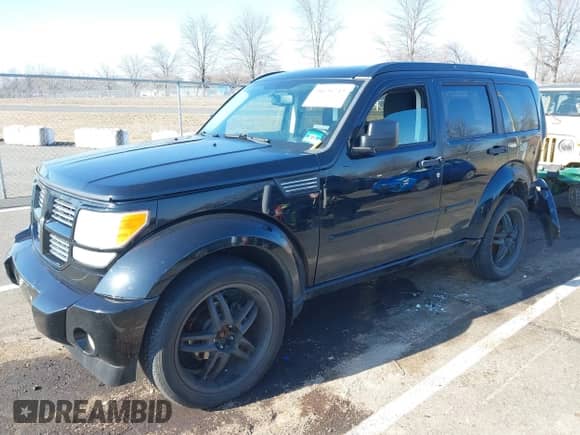 2007 Dodge Nitro R/T with VIN 1D8GU58687W702584, listed as a IAAI auction lot 41638743 with 123,018 mi miles and . Bid and sale history available at DreamBid. Image 18.