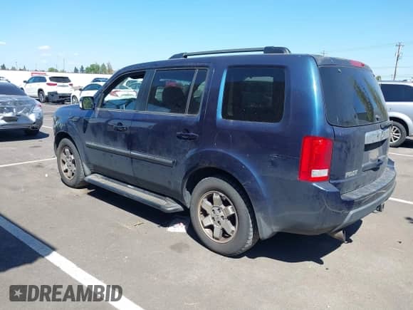 2010 Honda Pilot Touring с VIN 5FNYF4H90AB003639, выставлен на аукционе IAAI как лот 42935064 с пробегом 215 394 миль миль и . История ставок и продаж доступна на DreamBid. Изображение 3.