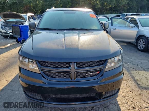 2017 Dodge Journey SE z VIN 3C4PDCABXHT684042, wystawiony jako Copart lot #80524115 z przebiegiem 128 061 mil mil oraz Czysty tytuł • Clean title. Historia ofert i sprzedaży dostępna na DreamBid. Obrazek 5.