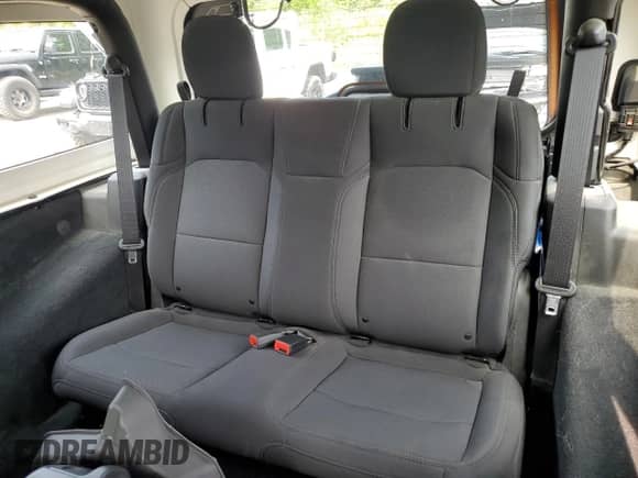 2022 Jeep Wrangler Willys Sport с VIN 1C4GJXANXNW263065, выставлен на аукционе Copart как лот 61211395 с пробегом 28 295 миль миль и Списание • Salvage title. История ставок и продаж доступна на DreamBid. Изображение 10.