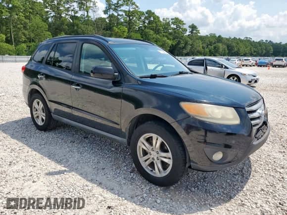 2012 Hyundai Santa Fe Limited with VIN 5XYZK3AB1CG135845, listed as a Copart auction lot 67735695 with 212,452 mi miles and Clean title. Bid and sale history available at DreamBid. Image 4.