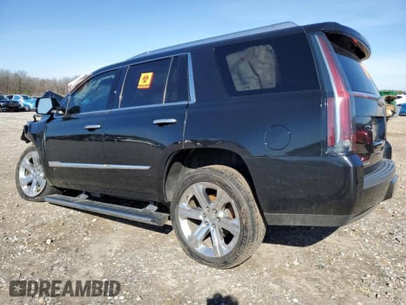 2015 Cadillac Escalade Platinum z VIN 1GYS4PKJ6FR625528, wystawiony jako Copart lot #45596195 z przebiegiem 104 936 mil mil oraz Szkoda całkowita • Salvage title. Historia ofert i sprzedaży dostępna na DreamBid. Obrazek 2.