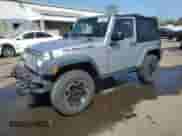 2015 Jeep Wrangler Rubicon Hard Rock z VIN 1C4BJWCG7FL655863, wystawiony jako Copart lot #68092975 z przebiegiem 89 667 mil mil oraz Szkoda całkowita • Salvage title. Historia ofert i sprzedaży dostępna na DreamBid. Obrazek 1.