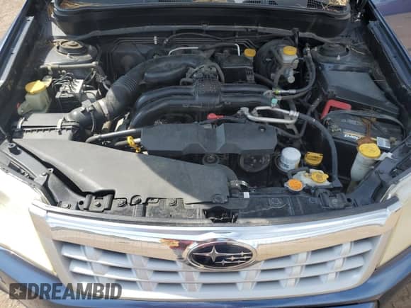 2013 Subaru Forester X z VIN JF2SHABC3DG434510, wystawiony jako Copart lot #67927925 z przebiegiem 136 376 mil mil oraz Szkoda całkowita • Salvage title. Historia ofert i sprzedaży dostępna na DreamBid. Obrazek 12.