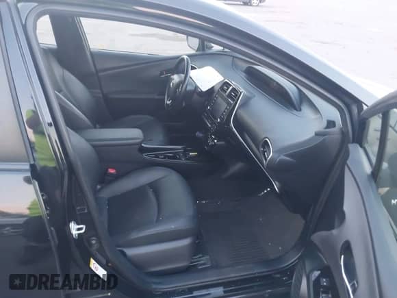 2022 Toyota Prius LE with VIN JTDKAMFU9N3159872, listed as a IAAI auction lot 42850013 with 49,455 mi miles and . Bid and sale history available at DreamBid. Image 5.