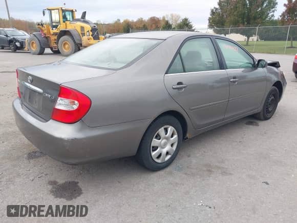 2004 Toyota Camry LE with VIN 4T1BE32K44U891723, listed as a IAAI auction lot 43449927 with 99,207 mi miles and . Bid and sale history available at DreamBid. Image 4.