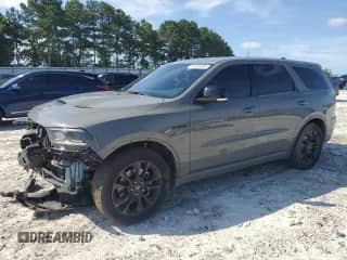 2021 Dodge Durango R/T with VIN 1C4SDHCT2MC740297, listed as a Copart auction lot 61597445 with 89,952 mi miles and Salvage title. Bid and sale history available at DreamBid. Image 1.