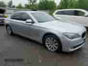 2011 BMW 7 Series 750i xDrive with VIN WBAKC6C55BC394717, listed as a Copart auction lot 59570605 with Not provided miles and Salvage title. Bid and sale history available at DreamBid. Image 4.