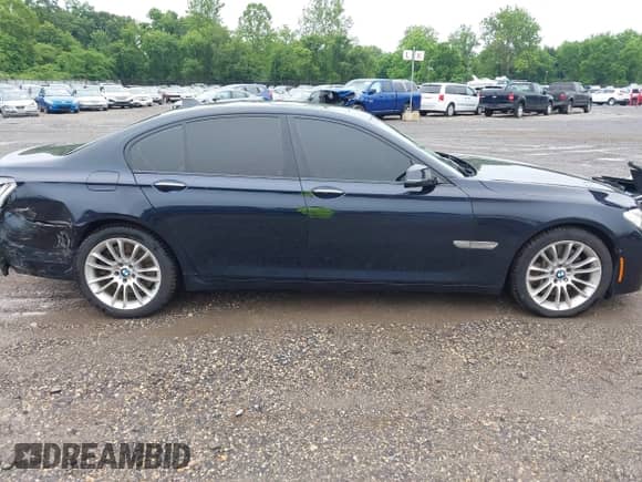 2013 BMW 7 Series 750i xDrive with VIN WBAYB6C50DC998045, listed as a IAAI auction lot 42450110 with 102,068 mi miles and . Bid and sale history available at DreamBid. Image 13.