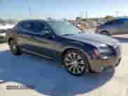 2014 Chrysler 300 S with VIN 2C3CCABT7EH119561, listed as a Copart auction lot 53995655 with 131,077 mi miles and Salvage title. Bid and sale history available at DreamBid. Image 4.