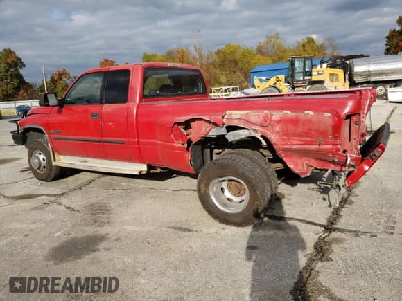 2002 Dodge 3500 с VIN 3B7MF33652M205850, выставлен на аукционе Copart как лот 76749504 с пробегом 220 734 миль миль и Списание • Salvage title. История ставок и продаж доступна на DreamBid. Изображение 2.