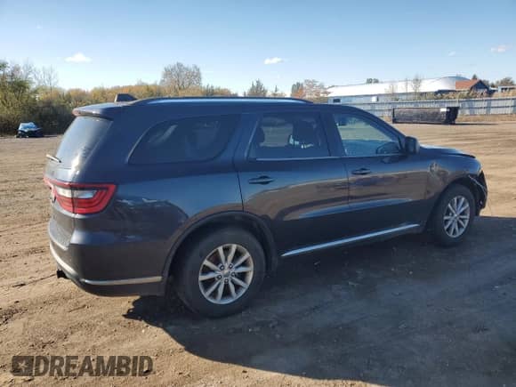 2014 Dodge Durango SXT z VIN 1C4RDJAG4EC514369, wystawiony jako Copart lot #87363605 z przebiegiem 211 065 mil mil oraz Szkoda całkowita • Salvage title. Historia ofert i sprzedaży dostępna na DreamBid. Obrazek 3.