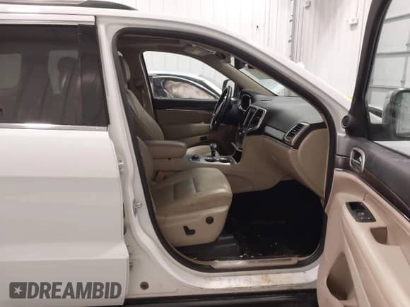 2014 Jeep Grand Cherokee Limited с VIN 1C4RJFBG3EC135822, выставлен на аукционе IAAI как лот 43235289 с пробегом 141 985 миль миль и . История ставок и продаж доступна на DreamBid. Изображение 5.