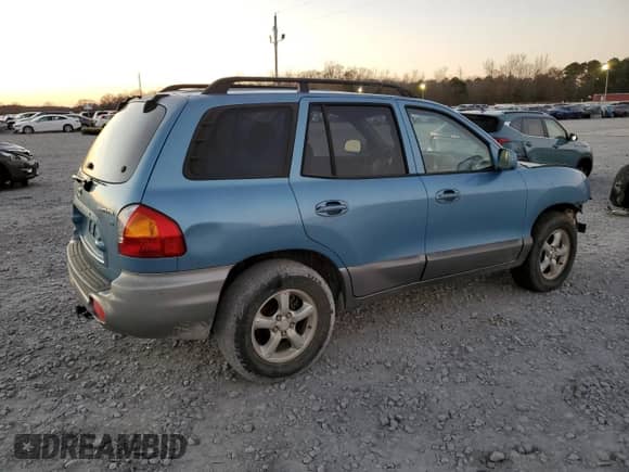 2003 Hyundai Santa Fe GLS с VIN KM8SC13D53U554812, выставлен на аукционе Copart как лот 86789014 с пробегом Не указан миль и Списание • Salvage title. История ставок и продаж доступна на DreamBid. Изображение 3.