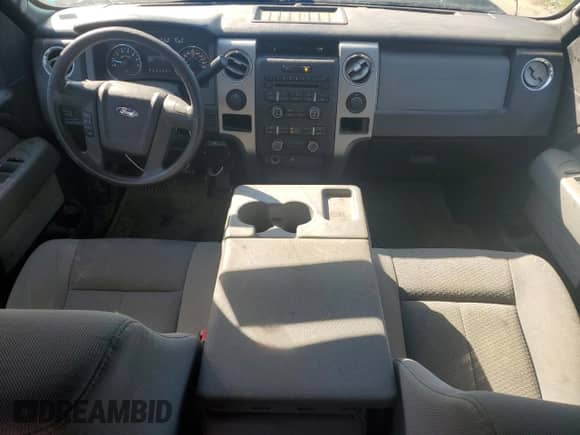 2012 Ford F-150 XL с VIN 1FTFW1EF3CFC63497, выставлен на аукционе Copart как лот 70918885 с пробегом 220 502 миль миль и Списание • Salvage title. История ставок и продаж доступна на DreamBid. Изображение 8.