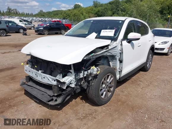 2022 Mazda CX-5 S Select z VIN JM3KFBBM5N0598278, wystawiony jako IAAI lot #42967602 z przebiegiem 26 412 mil mil oraz . Historia ofert i sprzedaży dostępna na DreamBid. Obrazek 2.